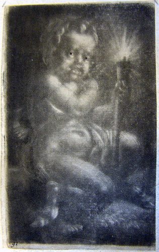 Ein Putto mit Kerze