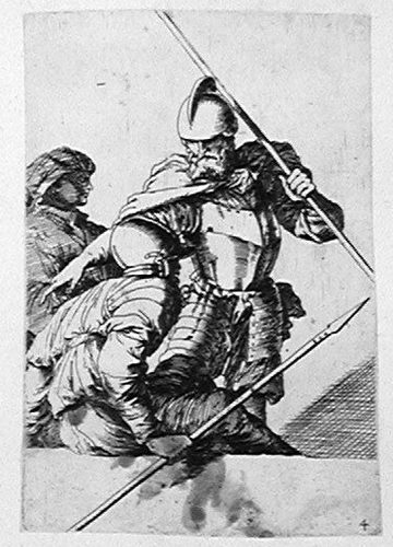 Zwei Soldaten, ein davon mit dem Bart und einem Helm